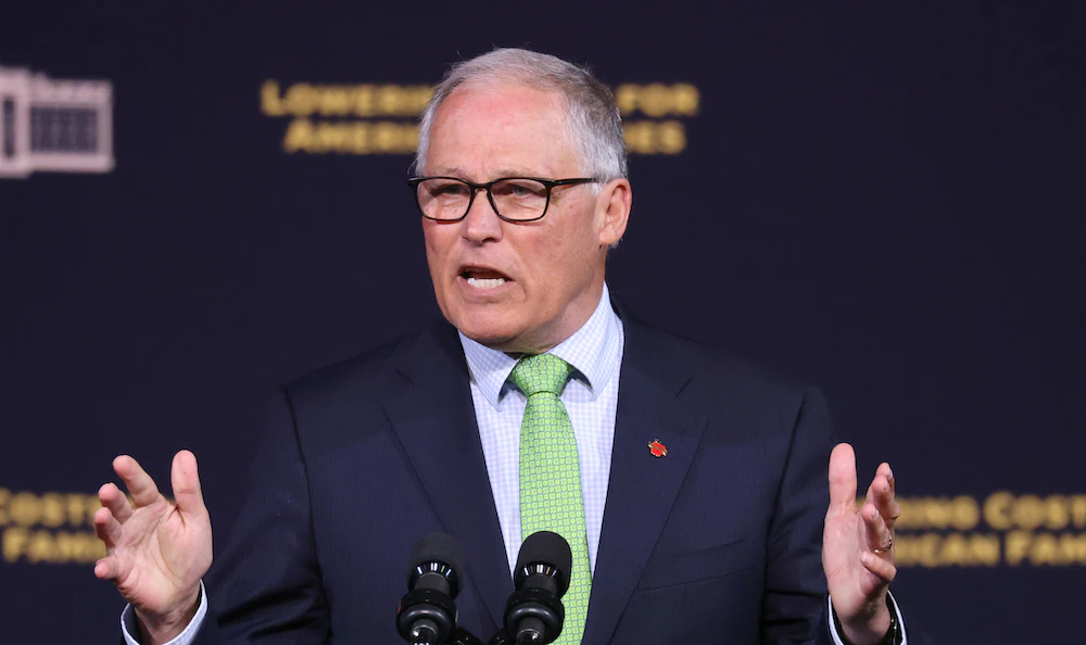 AUBURN, WA - APRIL 22: Washington state Governor Jay Inslee speaks prior to U.S. President Joe Biden at Green River College on April 22, 2022 in Auburn, Washington. Biden spoke about the high cost of prescription drugs and child care as hardships on American families. He is on a multi-day trip to the Pacific Northwest, with stops in Portland and Seattle. (Photo by Karen Ducey/Getty Images)