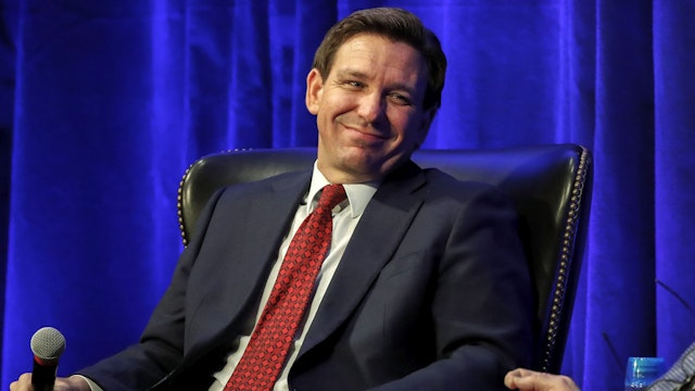 HILLSDALE, MI - APRIL 06: Florida Gov. Ron DeSantis (R-FL) listens to a question from Hillsdale College President Dr. Larry Arnn at Hillsdale College on April 6, 2023 in Hillsdale, Michigan. DeSantis spoke earlier in the day at a GOP breakfast in Midland, Michigan