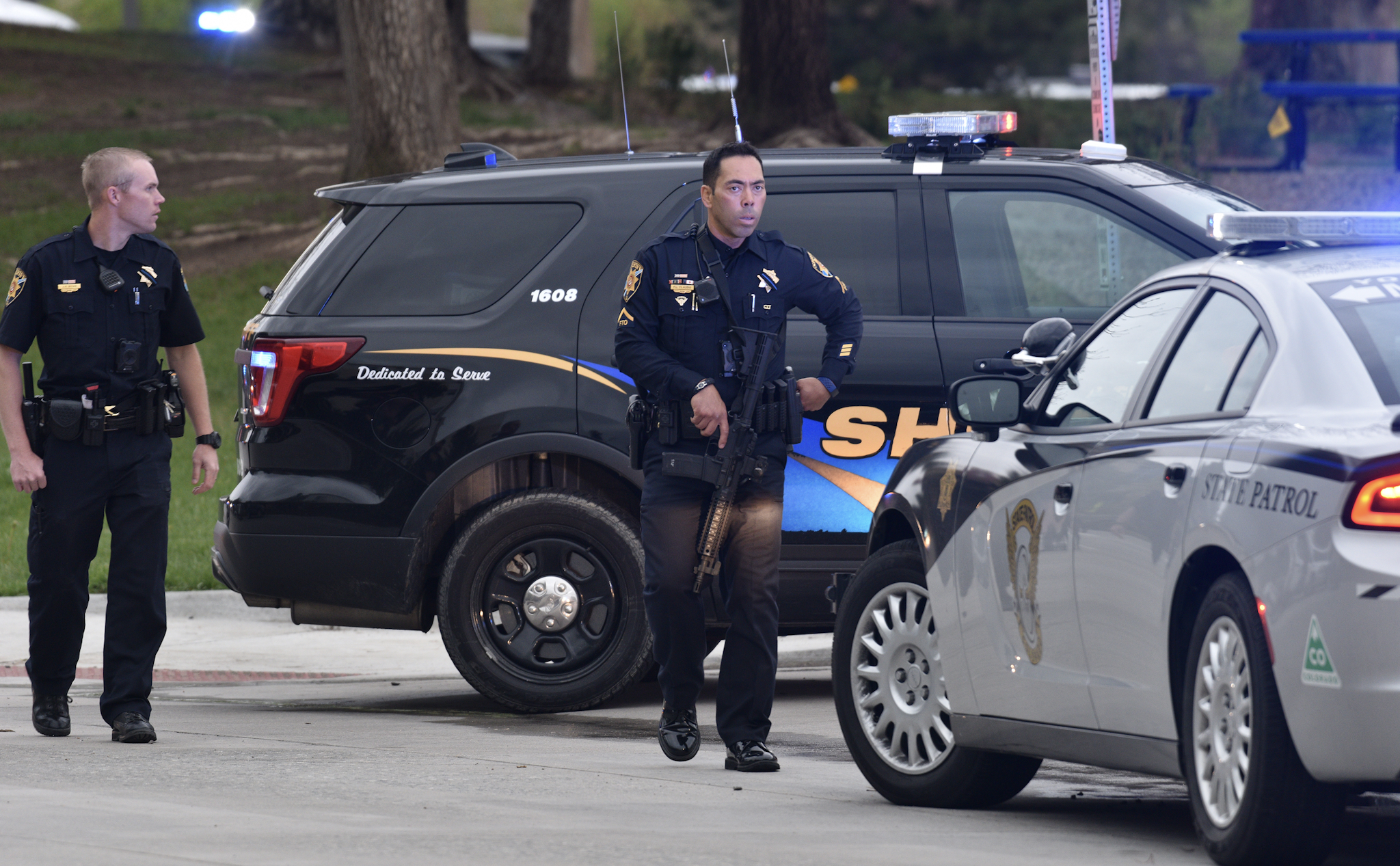 HIGHLANDS RANCH, COLORADO - MAY 07: Officers patrol the scene of a shooting in which at least seven students were injured at the STEM School Highlands Ranch on May 7, 2019 in Highlands Ranch, Colorado.