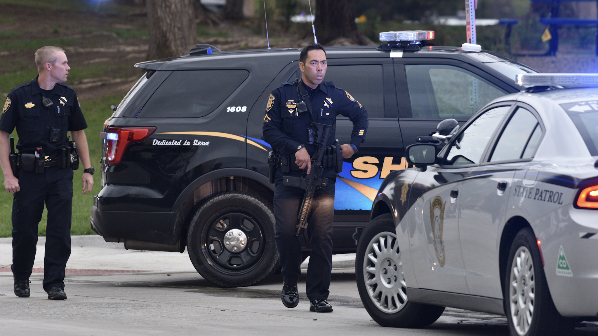 HIGHLANDS RANCH, COLORADO - MAY 07: Officers patrol the scene of a shooting in which at least seven students were injured at the STEM School Highlands Ranch on May 7, 2019 in Highlands Ranch, Colorado.