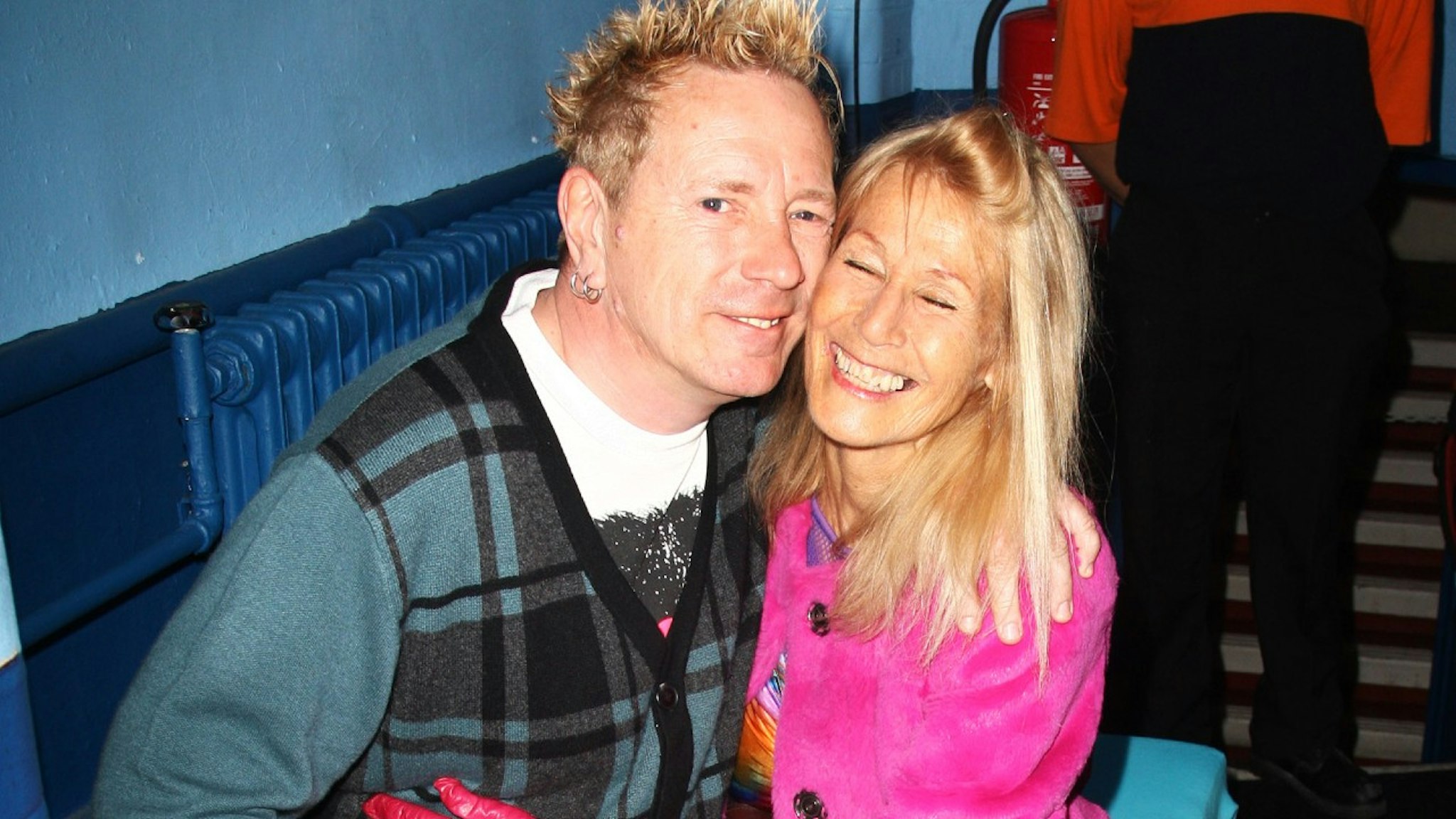 ohn Lydon formally of The Sex Pistols and Pil and his wife Nora Forster pose in front of the winners boards at the Shockwaves NME Awards 2011 held at Brixton Academy on February 23, 2011 in London, England.