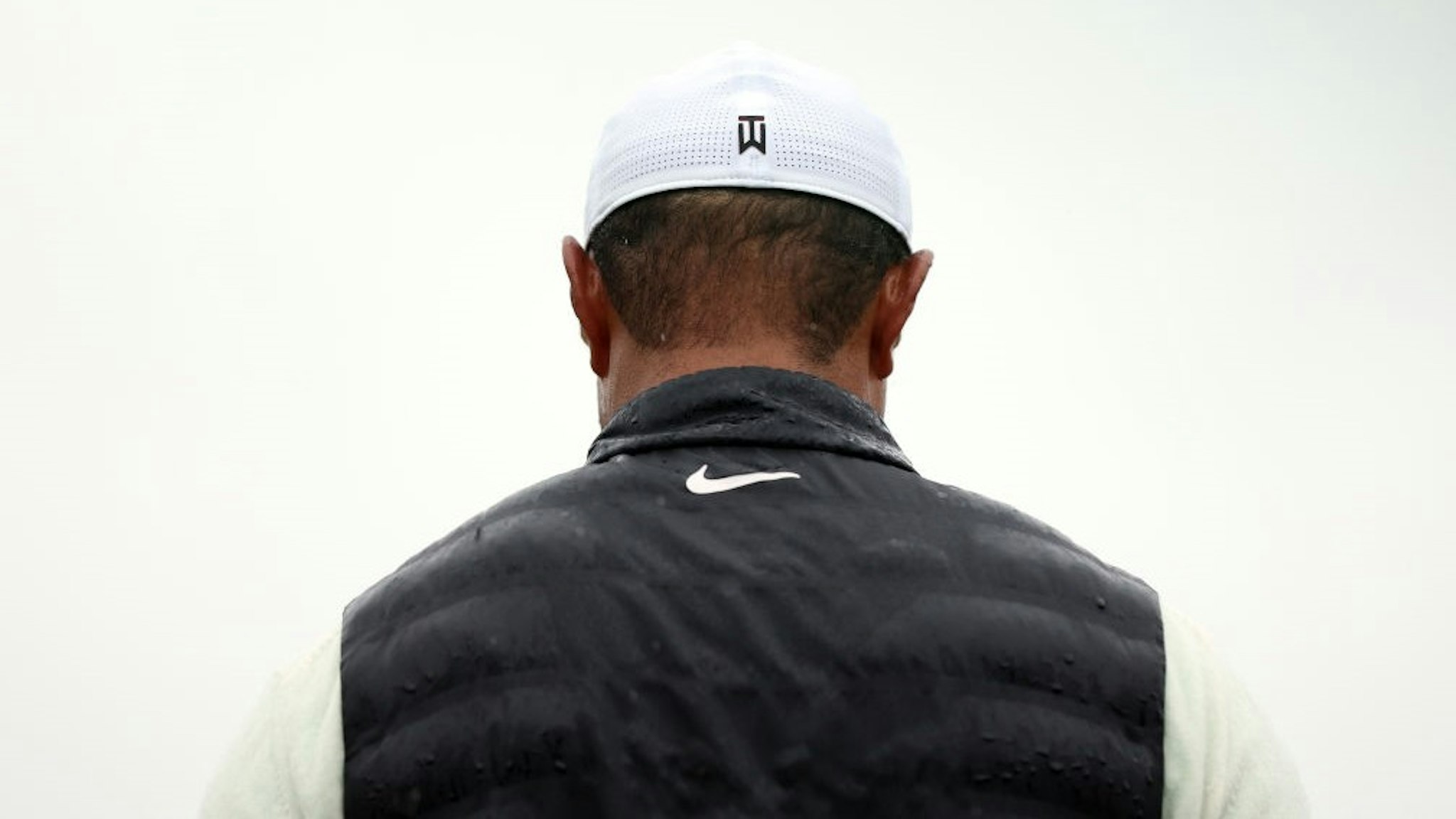 AUGUSTA, GEORGIA - APRIL 08: Tiger Woods of the United States looks on from the 18th green during the continuation of the weather delayed second round of the 2023 Masters Tournament at Augusta National Golf Club on April 08, 2023 in Augusta, Georgia. (Photo by