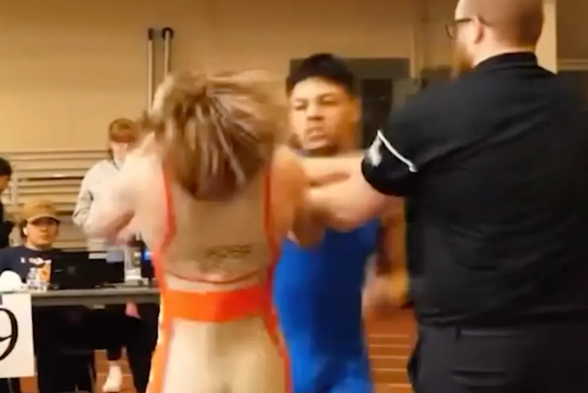 WATCH Illinois Youth Wrestler Sucker Punched After Match While Going
