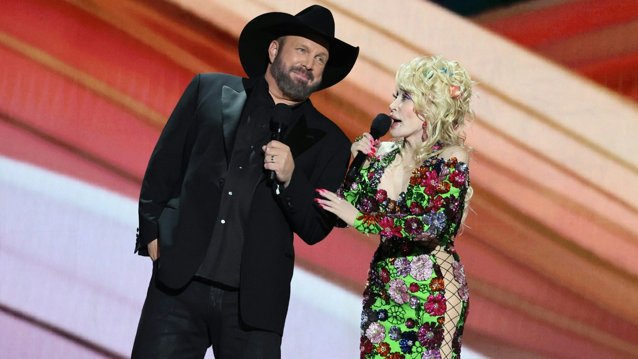 Co-hosts Garth Brooks and Dolly Parton speak onstage during the 58th Academy Of Country Music Awards at The Ford Center at The Star on May 11, 2023 in Frisco, Texas.