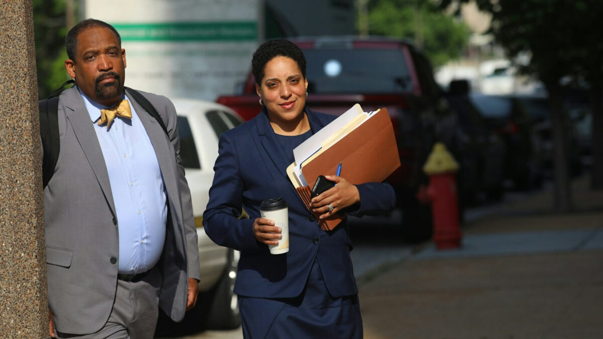 St. Louis Circuit Attorney Kim Gardner, right, and Ronald Sullivan, a Harvard law professor, arrive at the Civil Courts building on May 14, 2018.