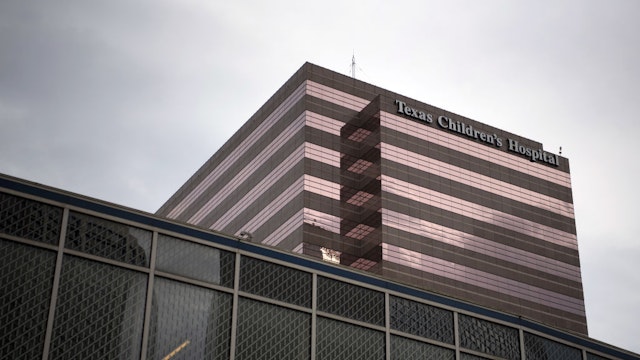 The Texas Children's Hospital stands at the Texas Medical Center (TMC) campus in Houston, Texas, U.S., on Wednesday, June 24, 2020. Harris County, which encompasses Houston, projects that ICU beds will be full in 11 days at the current pace of infections, according to county data. Photographer: Callaghan O'Hare/Bloomberg via Getty Images