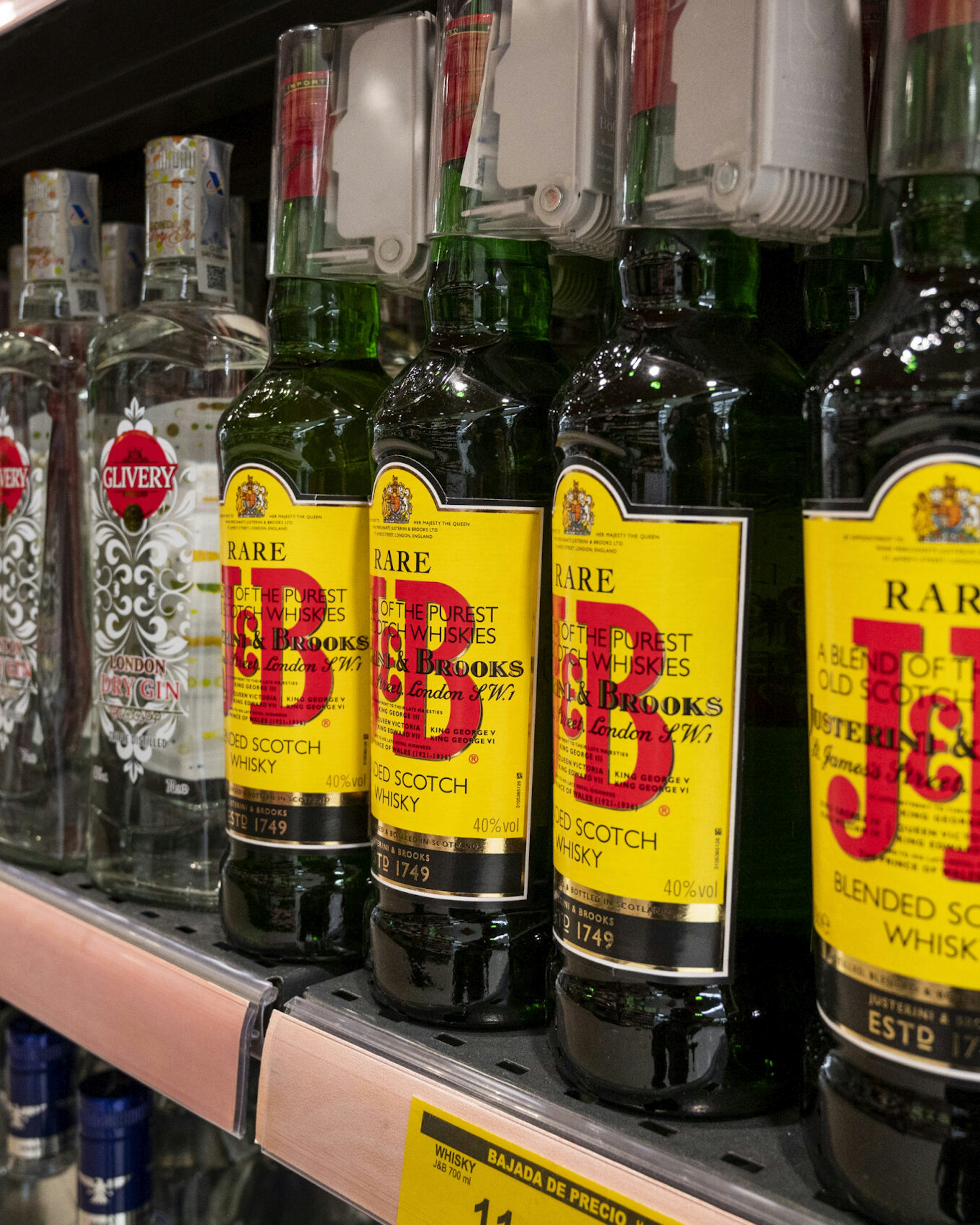 Bottles of Scotch Whisky brand, J&amp;B, rare blend label seen for sale at a supermarket in Spain.