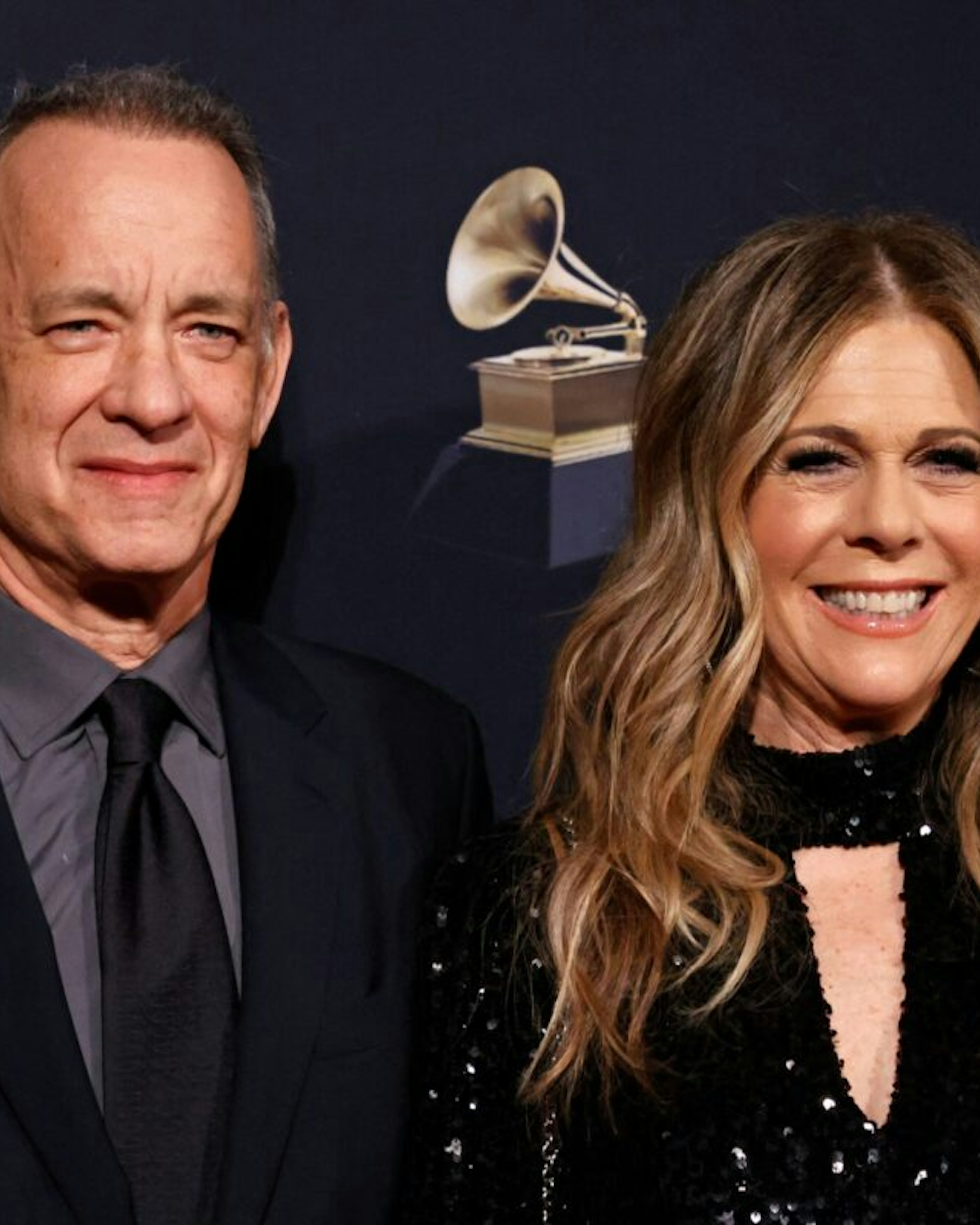 US actor Tom Hanks (L) and his wife US singer and actress Rita Wilson arrive for the Recording Academy and Clive Davis pre-Grammy gala at the Beverly Hilton hotel in Beverly Hills, California on February 4, 2023. (Photo by Michael TRAN / AFP) (Photo by MICHAEL TRAN/AFP via Getty Images)