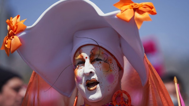 A member of The Sisters of Perpetual Indulgence marches with LGBTQ+ activists during the Los Angeles LGBT Center's "Drag March LA: The March on Santa Monica Boulevard", in West Hollywood, California, on Easter Sunday April 9, 2023.
