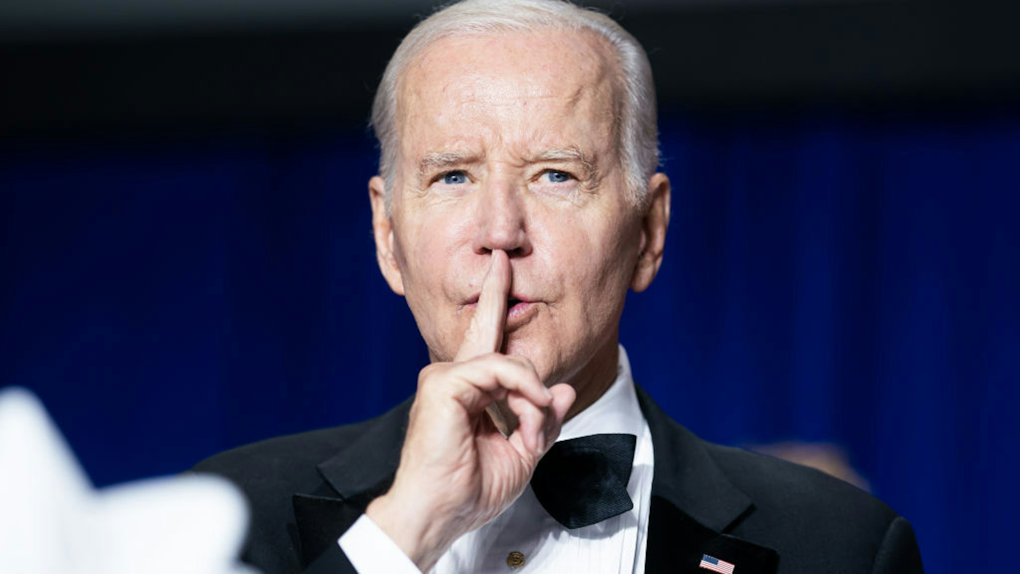 US President Joe Biden quiets the crowd during the White House Correspondents' Association (WHCA) dinner in Washington, DC, US, on Saturday, April 29, 2023. The annual dinner raises money for WHCA scholarships and honors the recipients of the organization's journalism awards. Photographer: