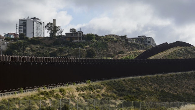 SAN DIEGO, UNITED STATES - MAY 11: Migrants are stuck between the Tijuana-San Diego border for the past week, hoping to enter the United States, after Title 42 expires in San Diego, CA, United States on May 11, 2023. (Photo by Carlos Moreno/Anadolu Agency via Getty Images)