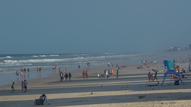 Beautiful view down New Smyrna Beach on the Atlantic Ocean in Volusia County, Florida