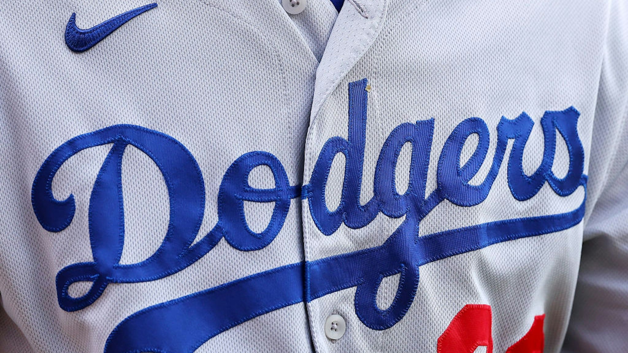 CHICAGO, ILLINOIS - APRIL 21: A detail of a Los Angeles Dodgers logo against the Chicago Cubs at Wrigley Field on April 21, 2023 in Chicago, Illinois. (Photo by Michael Reaves/Getty Images)
