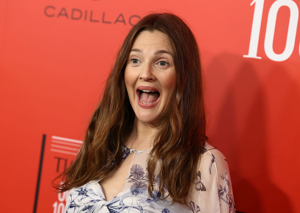 Drew Barrymore comforts crying fan and offers to take action.