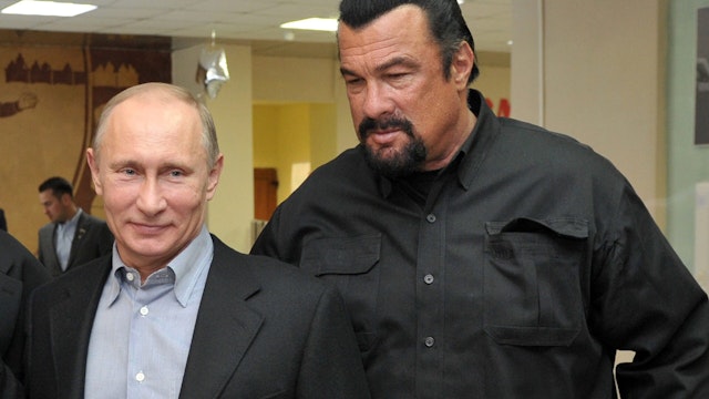 Russia's President Vladimir Putin and American action movie actor Steven Seagal