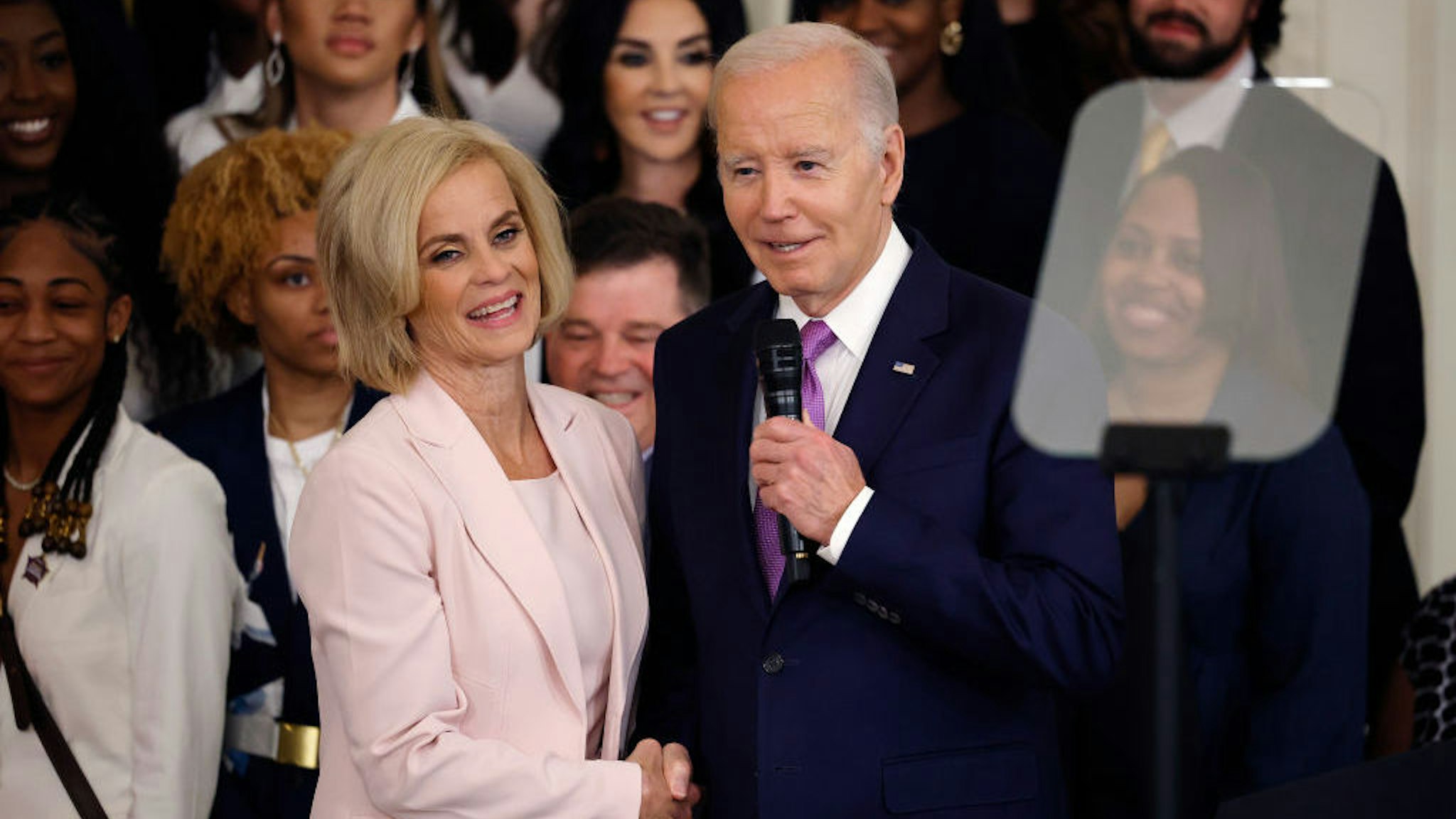 U.S. President Joe Biden and Louisiana State University women's basketball head coach Kim Mulkey deliver remarks during a celebration of the team's NCAA Division I national championship in the East Room of the White House on May 26, 2023 in Washington, DC. (Photo by Chip Somodevilla/Getty Images)