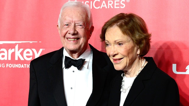 LOS ANGELES, CA - FEBRUARY 06: Former U.S. President Jimmy Carter (L) and former First Lady Rosalynn Carter attend the 25th anniversary MusiCares 2015 Person Of The Year Gala honoring Bob Dylan at the Los Angeles Convention Center on February 6, 2015 in Los Angeles, California. The annual benefit raises critical funds for MusiCares' Emergency Financial Assistance and Addiction Recovery programs.