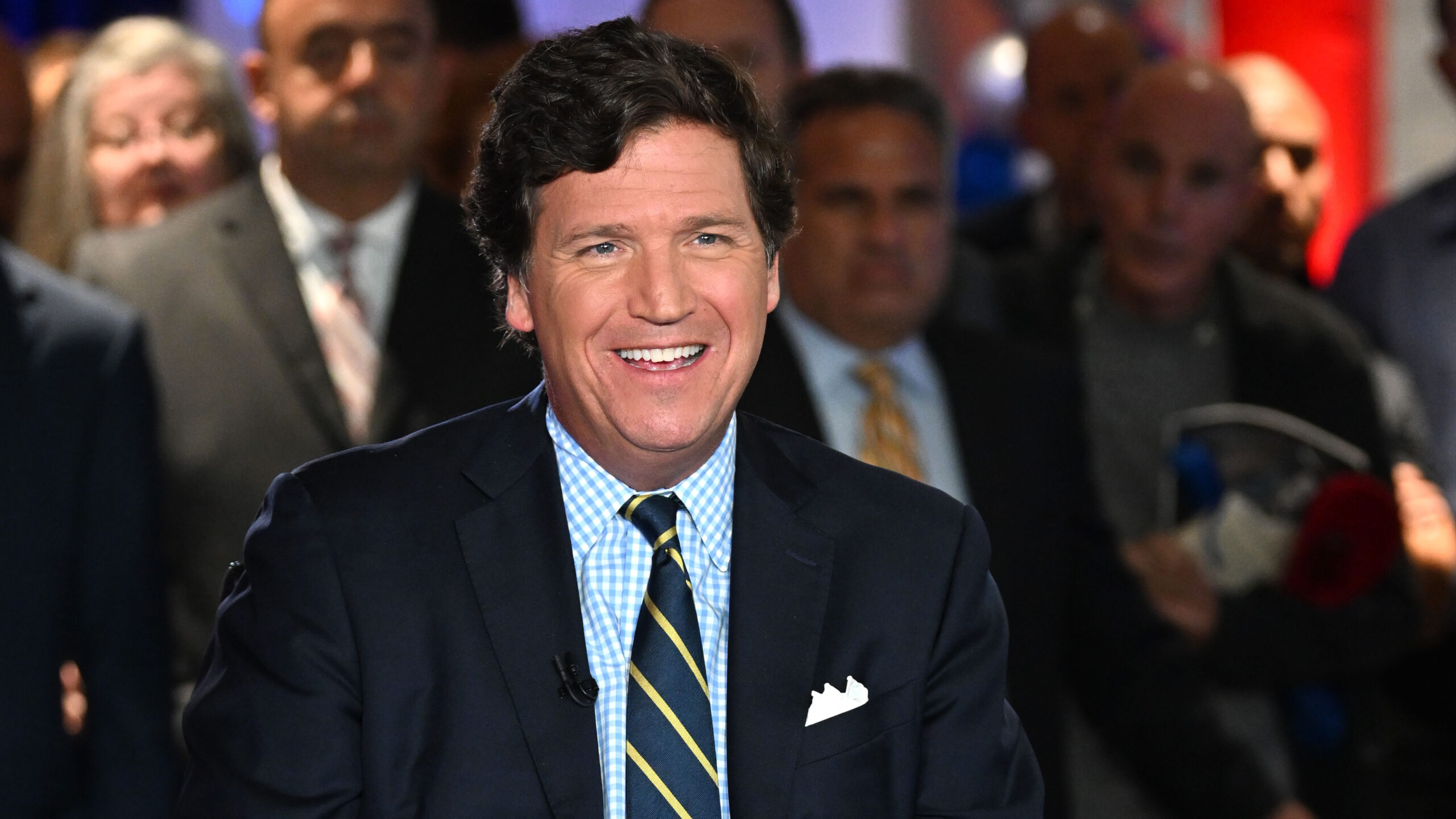 Tucker Carlson accuses Fox News of fraud and breaking contract.