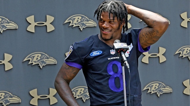 Baltimore Ravens quarterback Lamar Jackson takes questions after the Baltimore Ravens Mandatory Team Minicamp at the Under Armour Performance Center on June 16, 2022. Jackson will remain with the organization for years to come after signing a contract extension.