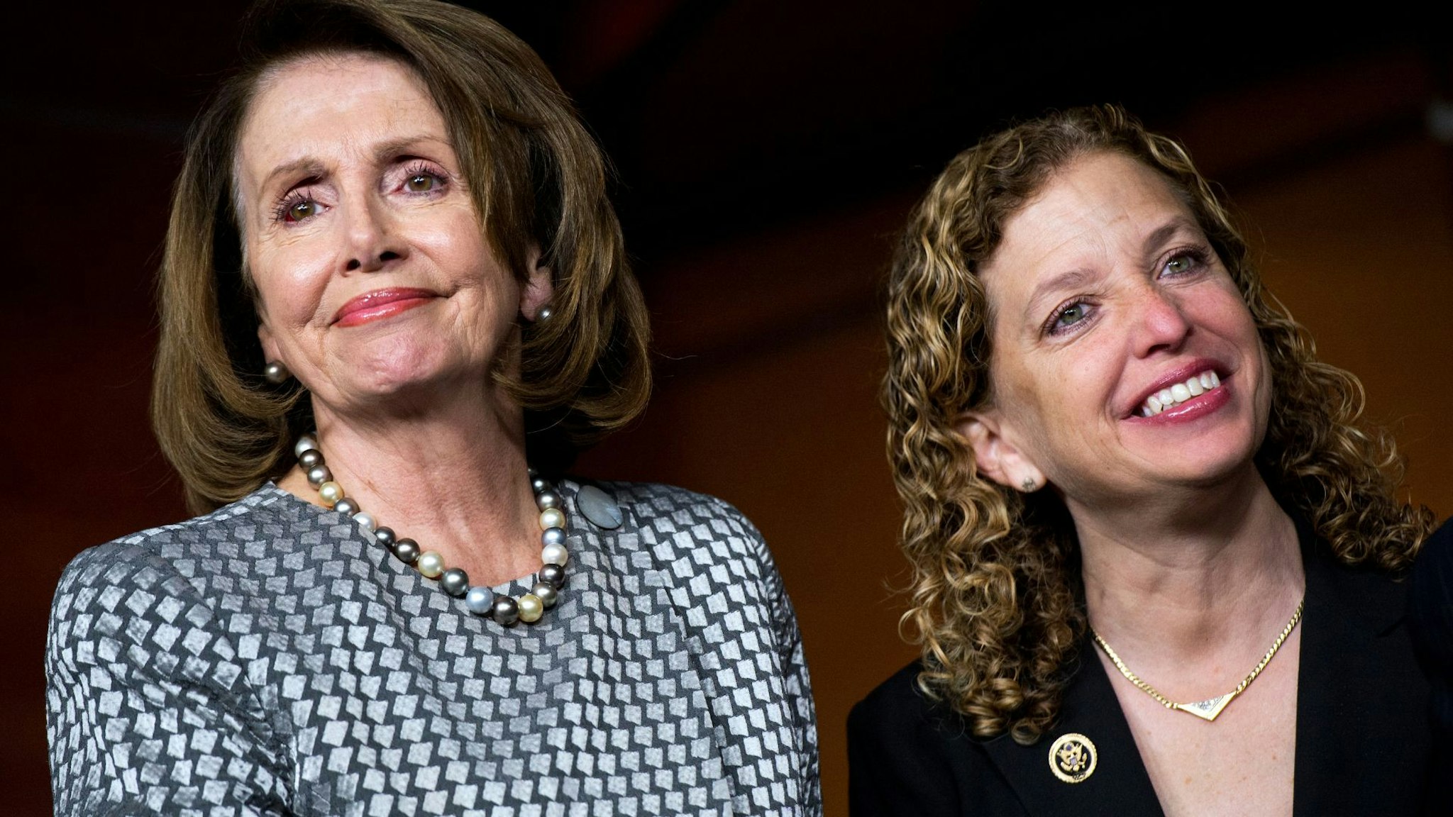 UNITED STATES - APRIL 28: House Minority Leader Nancy Pelosi, D-Calif., left, and Rep. Debbie Wasserman Schultz, D-Fla., attend a news conference in Capitol Visitor Center on the Equality Act which would "extend anti-discrimination protections to LGBT individuals," April 28, 2016.
