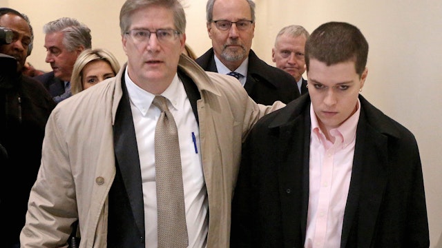 Riley Dowell, child of U.S. Rep. Katherine Clark, is lead out of Boston Municipal Court by her attorney Chris Dearborn after she was arraigned on charges of assault by means of a dangerous weapon, destruction or injury of personal property, and damage of property by graffiti/tagging on January 23, 2023 in Boston, Massachusetts.