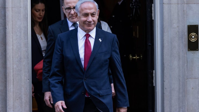 Benjamin Netanyahu, Prime Minister of Israel, leaves 10 Downing Street following brief talks with UK Prime Minister Rishi Sunak on 24 March 2023 in London, United Kingdom. Topics discussed are expected to have included an agreement to reinforce technology, trade and security links between the UK and Israel over the next seven years and Iran's attempts to acquire nuclear weapons. The Netanyahu government's plan to weaken the judicial system in Israel and a deteriorating security situation in the Occupied Palestinian Territories have led to huge protests in Israel and protests against Israel's human rights record have accompanied the Israeli Prime Minister's visit to London.