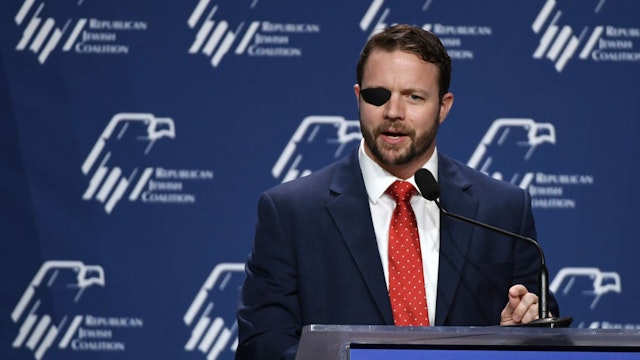 LAS VEGAS, NEVADA - APRIL 06: U.S. Rep. Dan Crenshaw (R-TX) speaks at the Republican Jewish Coalition's annual leadership meeting at The Venetian Las Vegas after appearances by U.S. President Donald Trump and Vice President Mike Pence on April 6, 2019 in Las Vegas, Nevada. Trump has cited his moving of the U.S. embassy in Israel to Jerusalem and his decision to pull the U.S. out of the Iran nuclear deal as reasons for Jewish voters to leave the Democratic party and support him and the GOP instead. (Photo by Ethan Miller/Getty Images)