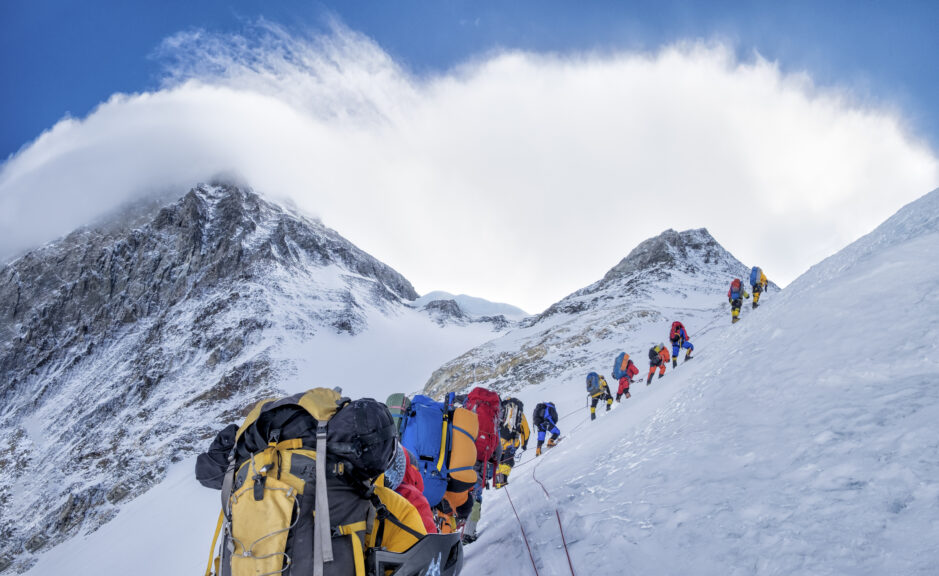 Nepal, Solo Khumbu, Everest, Sagamartha National Park, Roped team ascending, wearing oxigen masks - stock photo