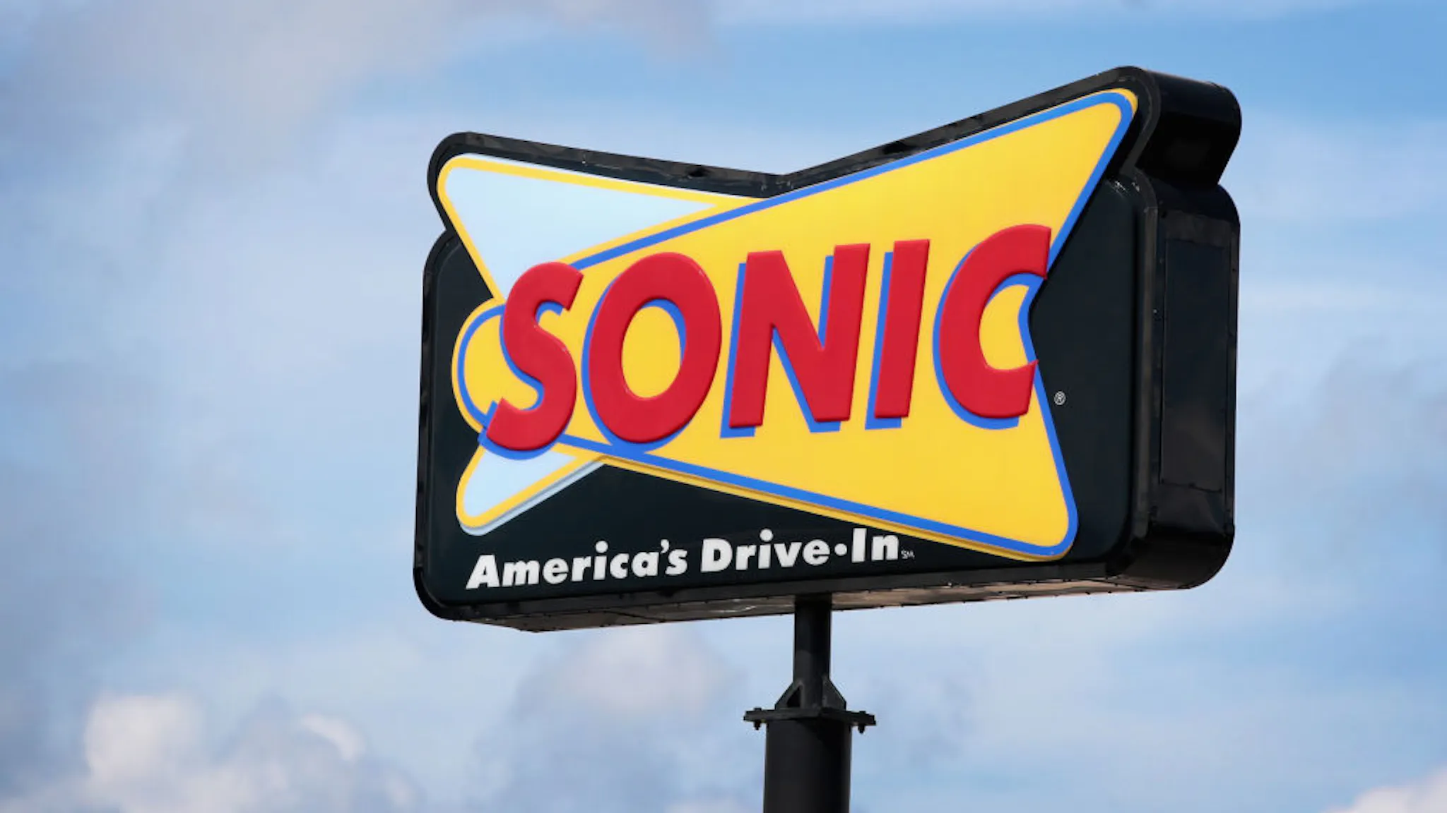 Inspire Brands Inc To Acquire Sonic Restaurant Chain For $2.3 Billion CICERO, IL - SEPTEMBER 25: A sign advertises the location of a Sonic restaurant on September 25, 2018 in Cicero, Illinois. Inspire Brands Inc., the parent company of Arby's and Buffalo Wild Wings, announced today that it was buying Sonic for $2.3 billion.