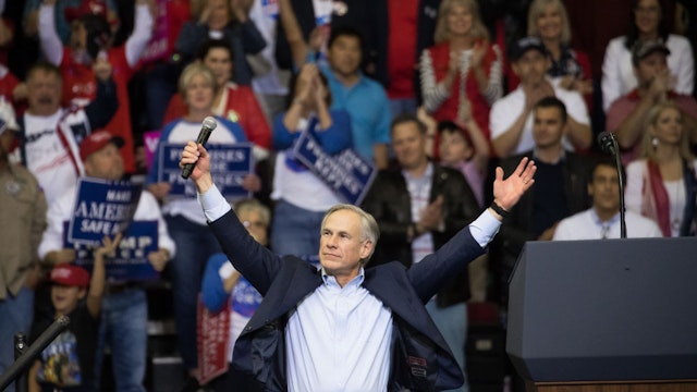 HOUSTON, TX - OCTOBER 22: Governor Greg Abbott of Texas addresses the crowd before President Donald Trump took the stage for a rally in support of Sen. Ted Cruz (R-TX) on October 22, 2018 at the Toyota Center in Houston, Texas. Cruz, the incumbent, is seeking Senate re-election in a high-profile race against Democratic challenger Beto O'Rourke.