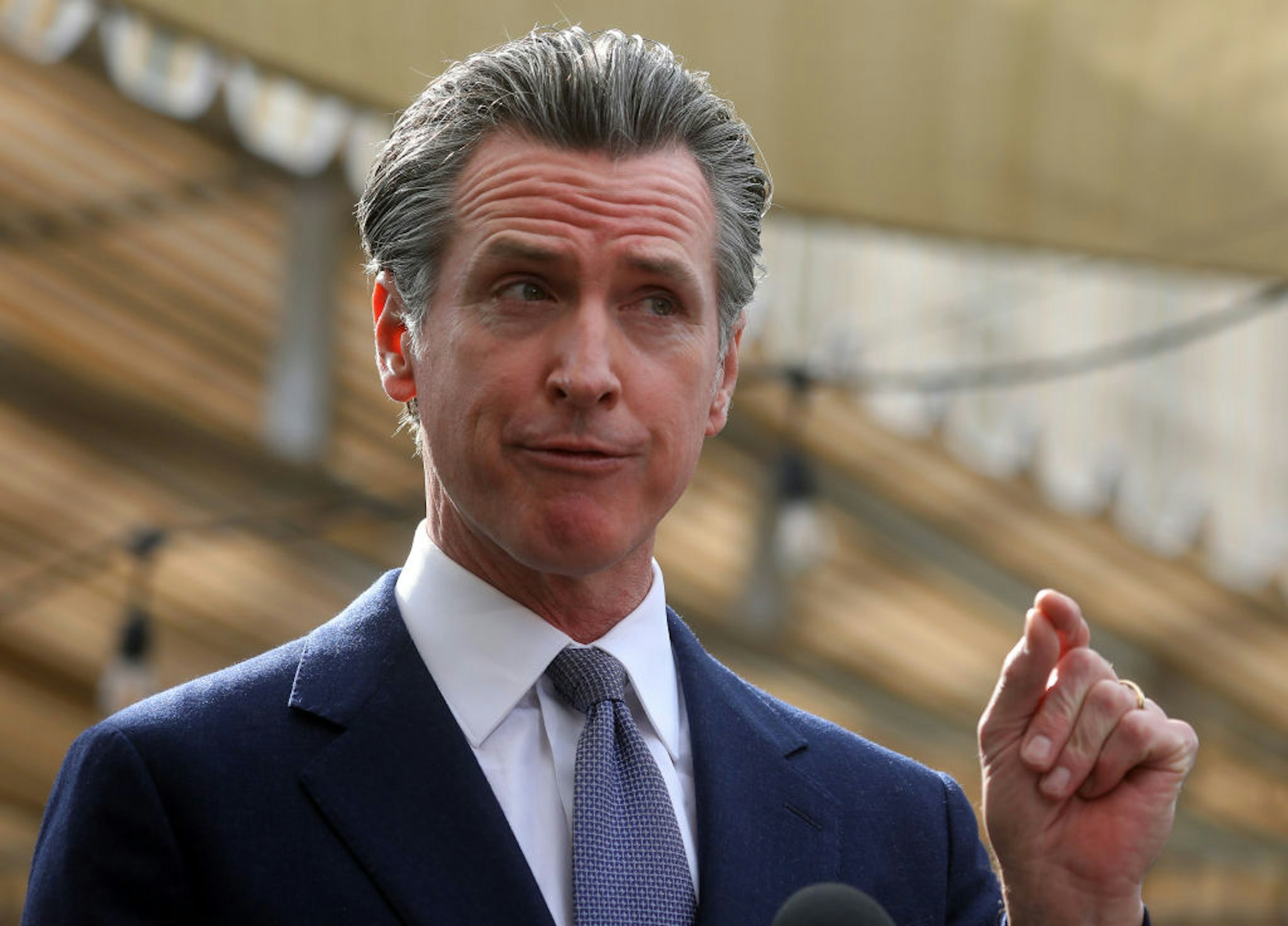 OAKLAND, CA - FEBRUARY 9: Governor Gavin Newsom speaks at a press conference on Wednesday, Feb. 9, 2022, in Oakland, Calif. Newsom signed legislation to extend COVID-19 supplemental paid sick leave for workers and bolster Californias support for small businesses. (Aric Crabb/MediaNews Group/East Bay Times via Getty Images)