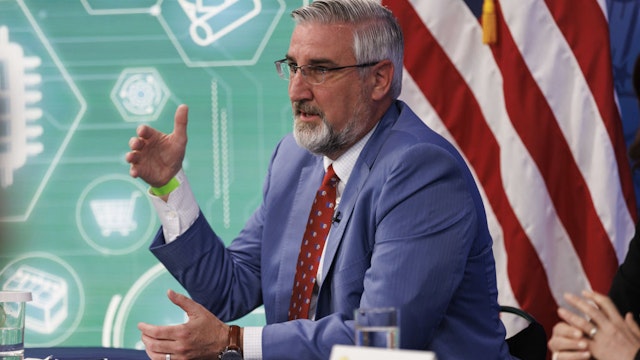 Eric Holcomb, governor of Indiana, speaks during a meeting with U.S. President Joe Biden, business leaders and governors in the Eisenhower Executive Office Building in Washington, D.C., U.S., on Wednesday, March 9, 2022. The Biden administration's long-awaited executive order for government agencies to take a closer look at issues surrounding the crypto market is being celebrated by industry participants despite it lacking a clear path on possible regulation.