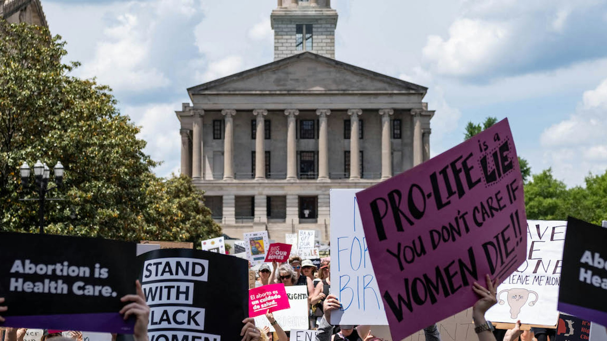Activists gather near the Tennessee State Capital building in Nashville, Tennessee, May 14,2022. (Photo by SETH HERALD / AFP) (Photo by SETH HERALD/AFP via Getty Images)