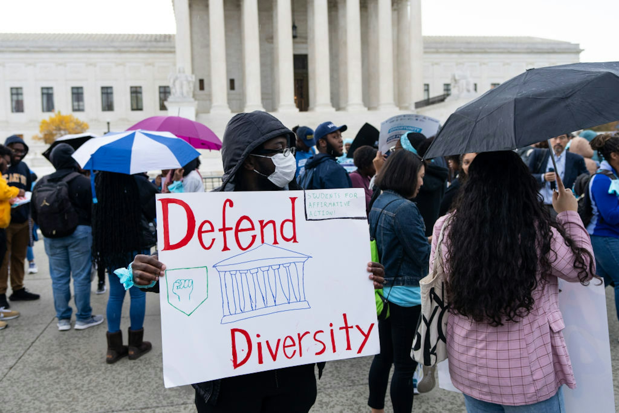 UNITED STATES - OCTOBER 31: Protesters gather in front of the U.S. Supreme Court as affirmative action cases involving Harvard and University of North Carolina admissions are heard by the court in Washington on Monday, October 31, 2022. (Bill Clark/CQ-Roll Call, Inc via Getty Images)