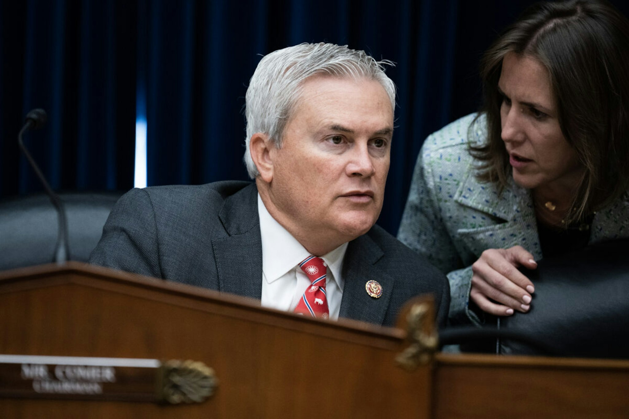 Chairman James Comer, R-Ky., talks with an aide during the House Oversight and Accountability Committee hearing titled "Overdue Oversight of the Capital City: Part II," in Rayburn Building on Tuesday, May 16, 2023.