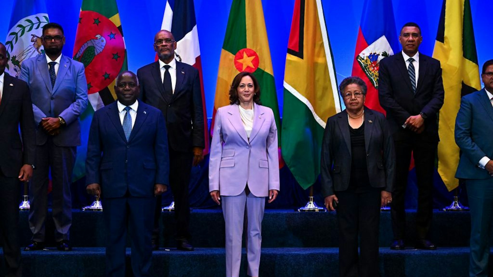 Prime Minister of The Bahamas Philip Davis (2nd L), US Vice President Kamala Harris (C), Secretary-General of the Caribbean Community (CARICOM) Carla N. Barnett (2nd R) pose for a family photo during the US-Caribbean Leaders Meeting in Nassau on June 8, 2023. (Photo by CHANDAN KHANNA / AFP)