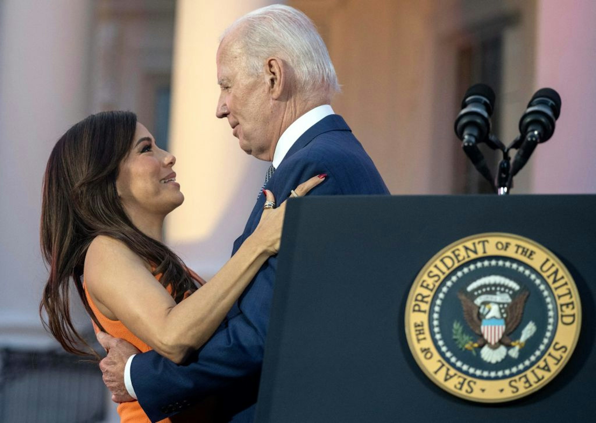 TOPSHOT - US actress and director Eva Longoria (L) greets US President Joe Biden during a screening of the film "Flamin' Hot" on the South Lawn of the White House in Washington, DC, June 15, 2023. (Photo by ANDREW CABALLERO-REYNOLDS / AFP) (Photo by ANDREW CABALLERO-REYNOLDS/AFP via Getty Images)