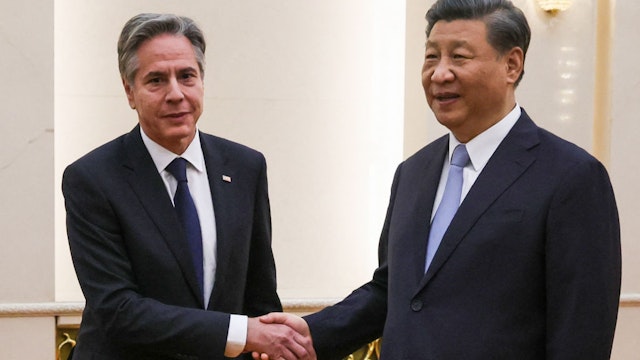 TOPSHOT - US Secretary of State Antony Blinken (L) shakes hands with China's President Xi Jinping at the Great Hall of the People in Beijing on June 19, 2023. President Xi Jinping hosted Antony Blinken for talks in Beijing on June 19, capping two days of high-level talks by the US secretary of state with Chinese officials. (Photo by Leah MILLIS / POOL / AFP)