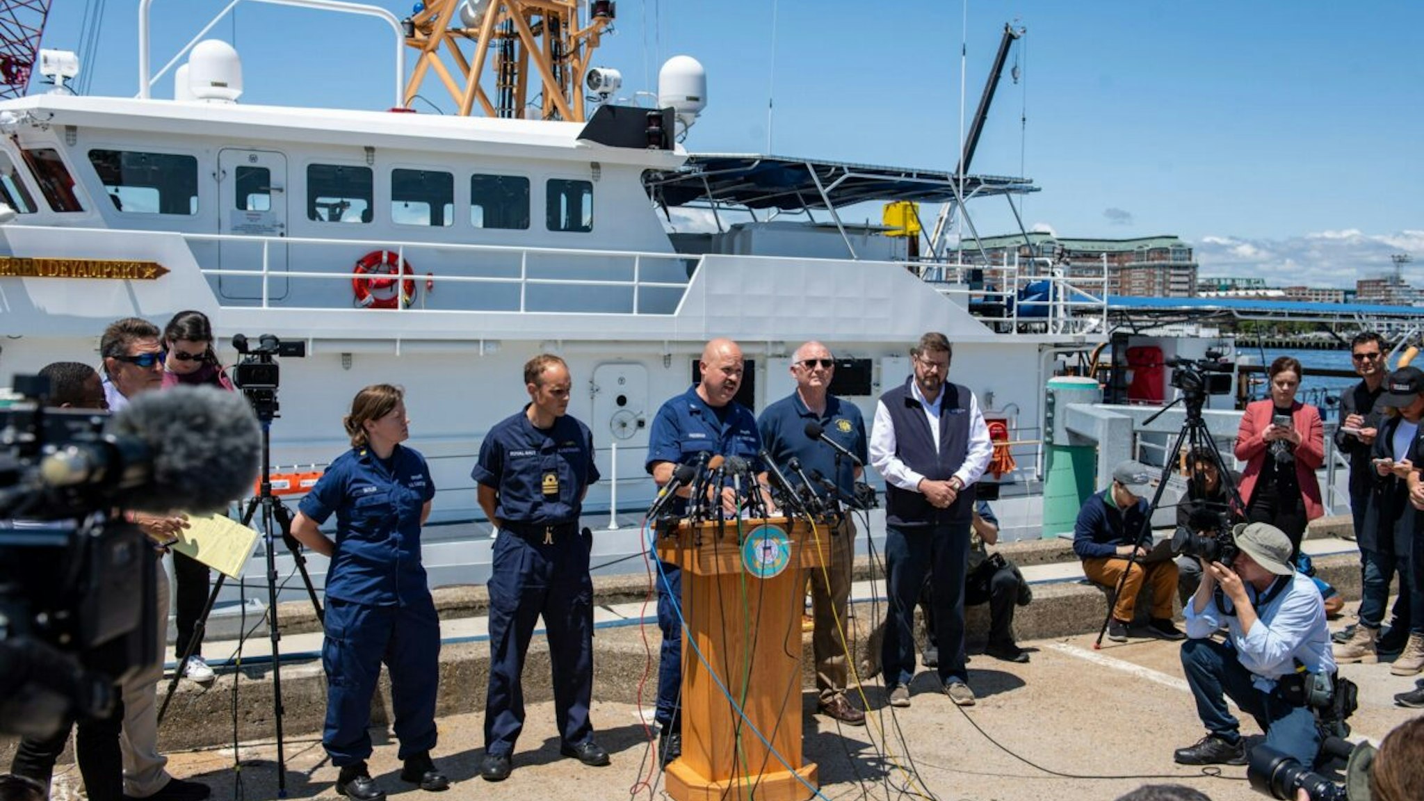 US Coast Guard (USCG) Captain Jamie Frederick speaks to reporters about the search efforts for the Titan submersible that went missing near the wreck of the Titanic, at Coast Guard Base in Boston, Massachusetts, on June 21, 2023. The USCG said Wednesday it had not identified the source of underwater noises detected by sonar in the search for the missing submersible. "We don't know what they are, to be frank with you," Frederick said regarding the sounds that had raised hopes the five people onboard are still alive. "We have to remain optimistic and hopeful when you're in a search and rescue case," he told reporters. (Photo by Joseph Prezioso / AFP)