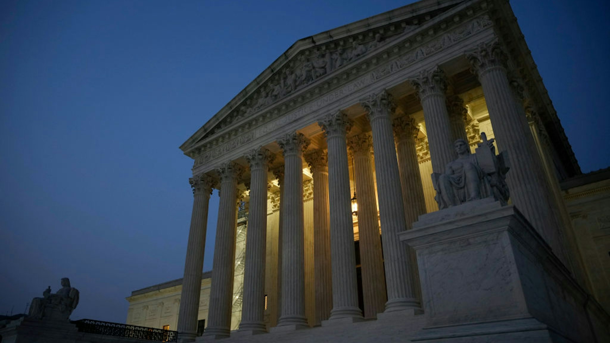 WASHINGTON, DC - JUNE 28: The U.S. Supreme Court is shown at dusk on June 28, 2023 in Washington, DC. The high court is expected to release more opinions tomorrow ahead of its summer recess, with cases involving affirmative action and student loan debt relief still to be decided. (Photo by Drew Angerer/Getty Images)