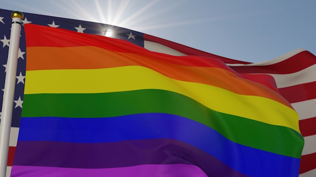 Pride rainbow flag and American stars and stripes waving in the wind together with clouds and sky in the background. 3D rendering.