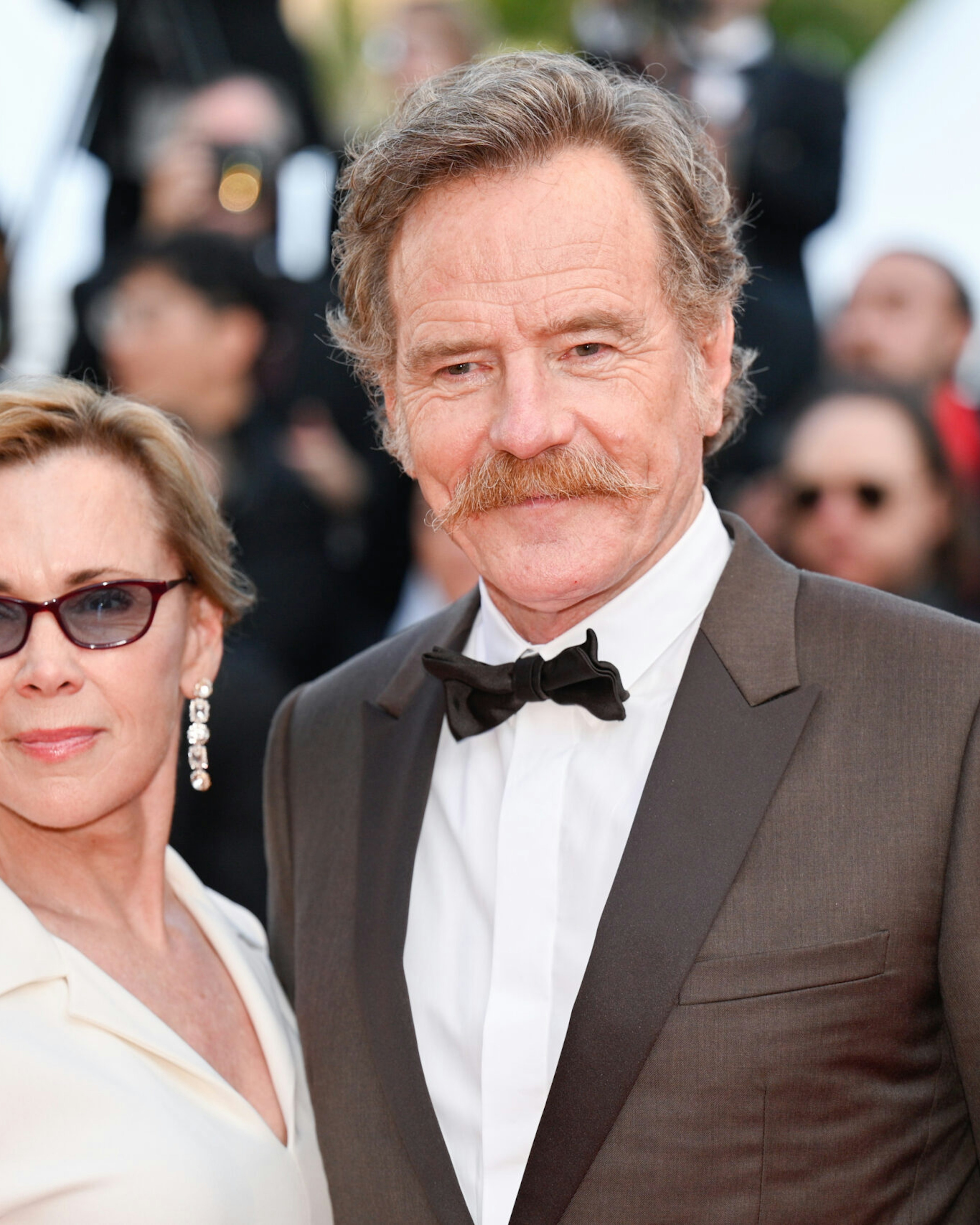 CANNES, FRANCE - MAY 23: Robin Dearden and Bryan Cranston attends the "Asteroid City" red carpet during the 76th annual Cannes film festival at Palais des Festivals on May 23, 2023 in Cannes, France. (Photo by Stephane Cardinale - Corbis/Corbis via Getty Images)