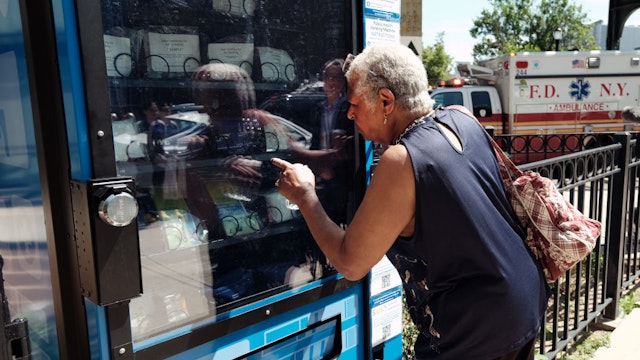 NEW YORK, NEW YORK - JUNE 05: Rose Meredith uses a new vending machine in Brooklyn that will disperse fentanyl test strips and naloxone as well as hygiene kits, maxi pads, Vitamin C, and COVID-19 tests for free on June 05, 2023 in New York City. Operated jointly by Services for the UnderServed (S:US) and the city Health Department, the vending machine will only ask for a zip code before letting customers choose free items 24 hours a day. New York City plans to place more free public health vending machines in other neighborhoods shortly. (Photo by Spencer Platt/Getty Images)