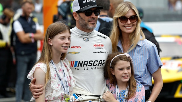 Jimmie Johnson of the #24 NASCAR Next Gen Chevrolet ZL1 looks on with his family during the 100th anniversary of the 24 Hours of Le Mans at the Circuit de la Sarthe June 10, 2023 in Le Mans, France.