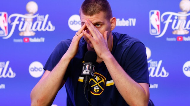 DENVER, COLORADO - JUNE 12: Nikola Jokic #15 of the Denver Nuggets speaks with media after a 94-89 victory against the Miami Heat in Game Five of the 2023 NBA Finals to win the NBA Championship at Ball Arena on June 12, 2023 in Denver, Colorado. NOTE TO USER: User expressly acknowledges and agrees that, by downloading and or using this photograph, User is consenting to the terms and conditions of the Getty Images License Agreement. (Photo by Justin Edmonds/Getty Images)