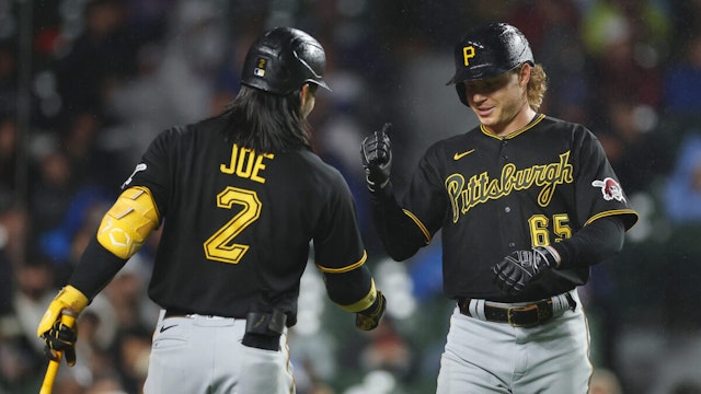 Jack Suwinski #65 of the Pittsburgh Pirates celebrates with Connor Joe #2 after hitting a solo home run during the sixth inning against the Chicago Cubs at Wrigley Field on June 13, 2023 in Chicago, Illinois.