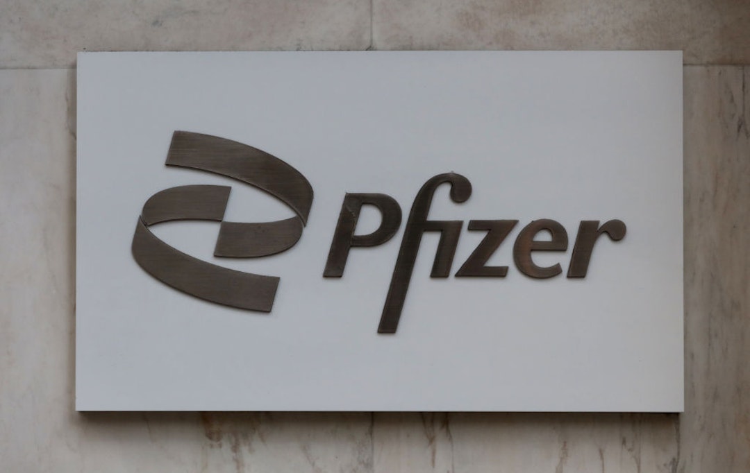 NEW YORK, NY - JUNE 15: A Pfizer corporate logo hangs on a wall at their headquarters on 42nd Street on June 15, 2023, in New York City.