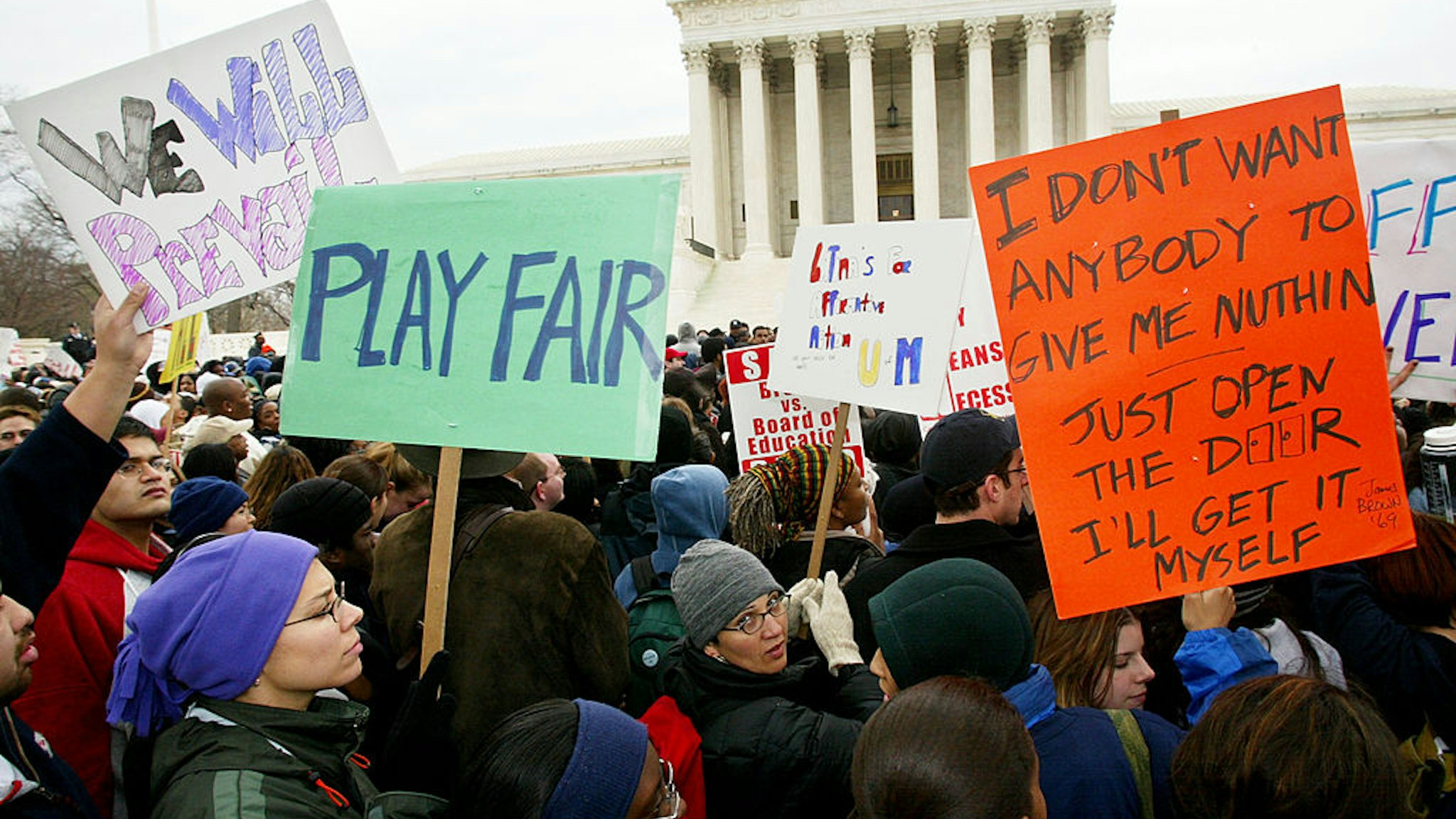 WASHINGTON - APRIL 1: Affirmative action supporters rally outside the U.S. Supreme Court April 1, 2003 in Washington, DC. The Supreme Court heard oral arguments in the University of Michigan affirmative action cases to see if the school can consider race in the undergraduate and law school admissions. (Photo by Alex Wong/Getty Images)