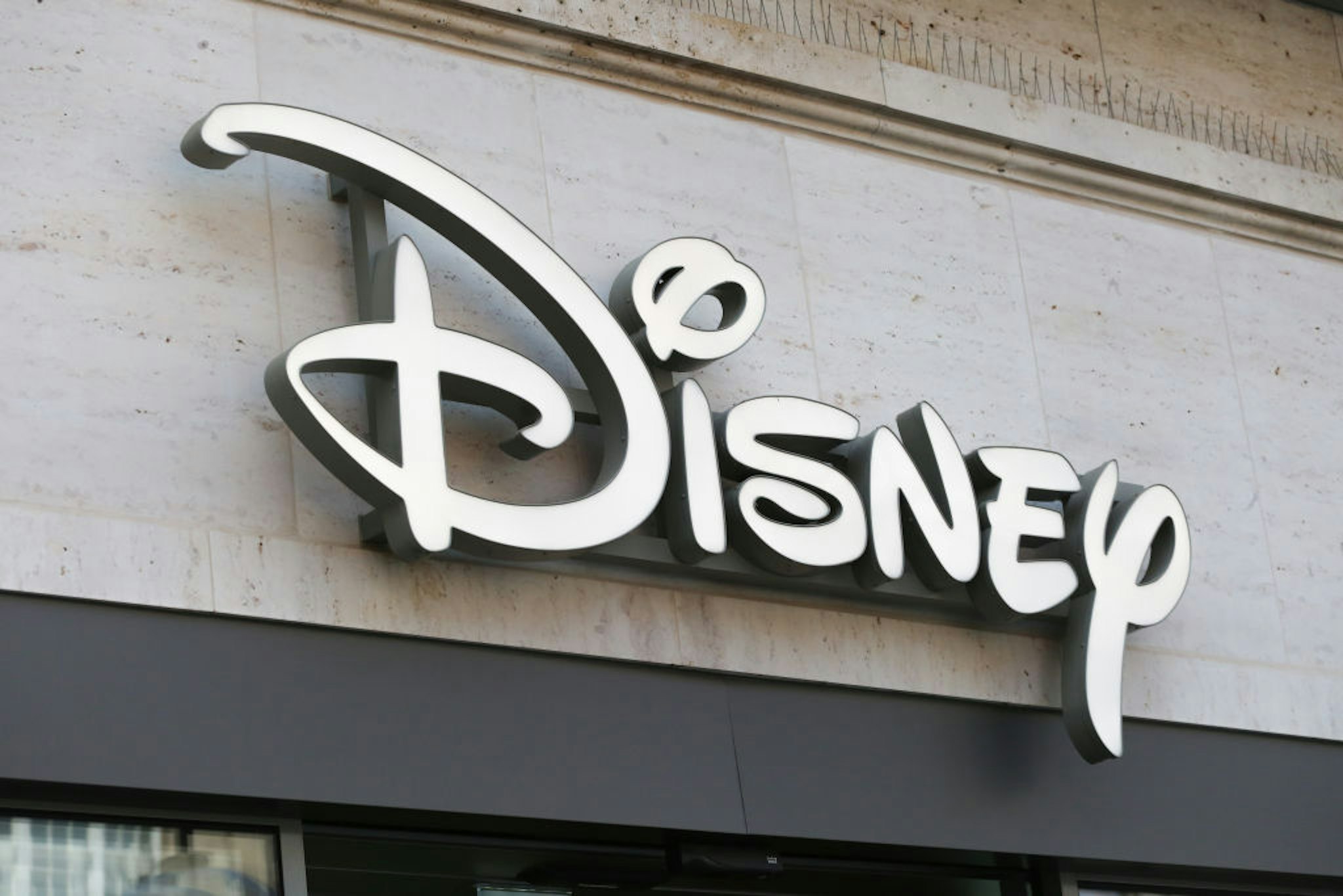 The logo of Disney is seen in the Munich pedestrian zone.