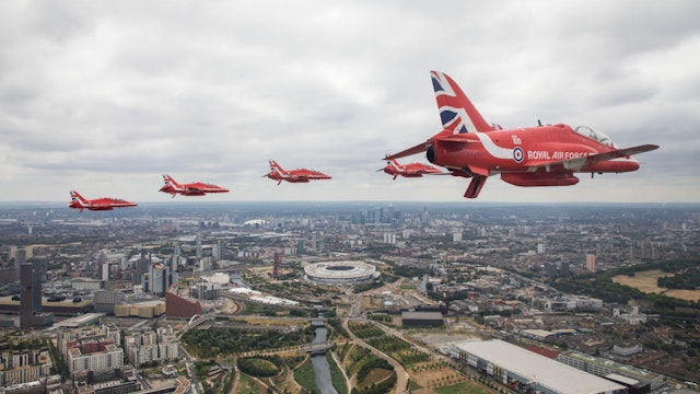 LONDON, ENGLAND - JULY 10: In this handout image provided by the Ministry of Defence, Royal Air Force Aerobatic Team taking part in the Centenary Flypast over Buckingham Palace during RAF 100 celebrations on July 10, 2018 in London, England. A centenary parade and a flypast of up to 100 aircraft over Buckingham Palace takes place today to mark the Royal Air Forces' 100th birthday.